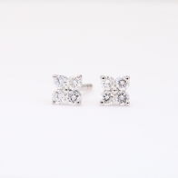 NXT Flora white diamond flower stud earrings