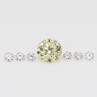 0.48 Total carat parcel of round-cut white and fancy yellow diamonds