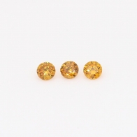 0.15 Total carat trio of round-cut orange diamonds