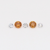 0.18 Total carat parcel of round-cut orange and white diamonds