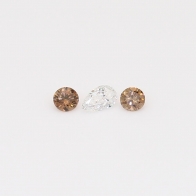 0.14 Total carat trio of round-cut champagne and white diamonds