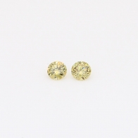 0.10 Total carat pair of round-cut yellow diamonds