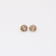 0.08 Total carat pair of round-cut champagne diamonds