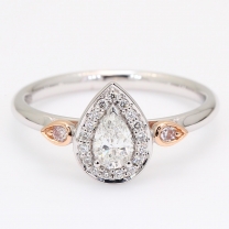 Alicorn pear and round-cut white and Argyle pink diamond halo ring