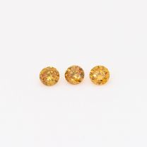 0.15 Total carat trio of round-cut orange diamonds