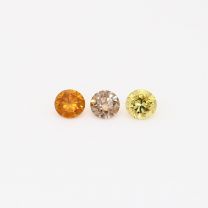 0.18 Total carat trio of round-cut rainbow diamonds