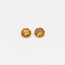 0.16 Total carat pair of round-cut orange diamonds