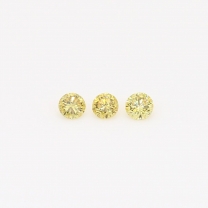 0.12 Total carat trio of round-cut fancy green diamonds